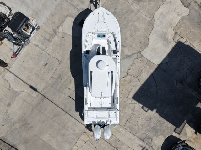 Aerial view of a 2026 Tidewater 3100 Carolina Bay boat on concrete.