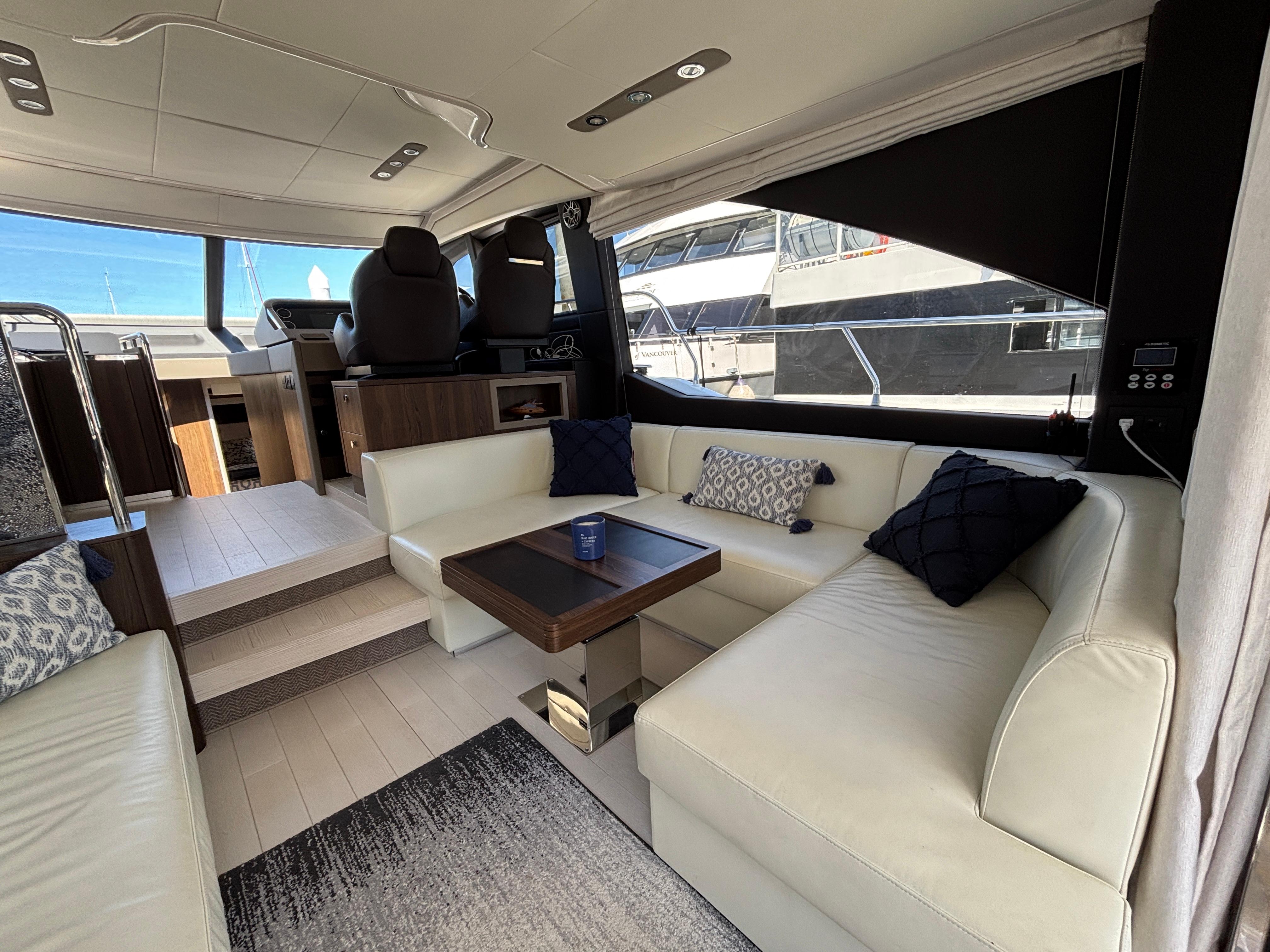 Luxurious interior of 2019 Azimut Fly 50 yacht with elegant seating and modern design.