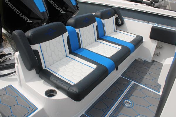 2024 Fountain 34 SC boat seating with blue and white upholstery, featuring modern design and comfort.