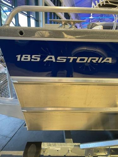 2024 Spartan 185 Astoria boat exterior with blue and silver detailing.