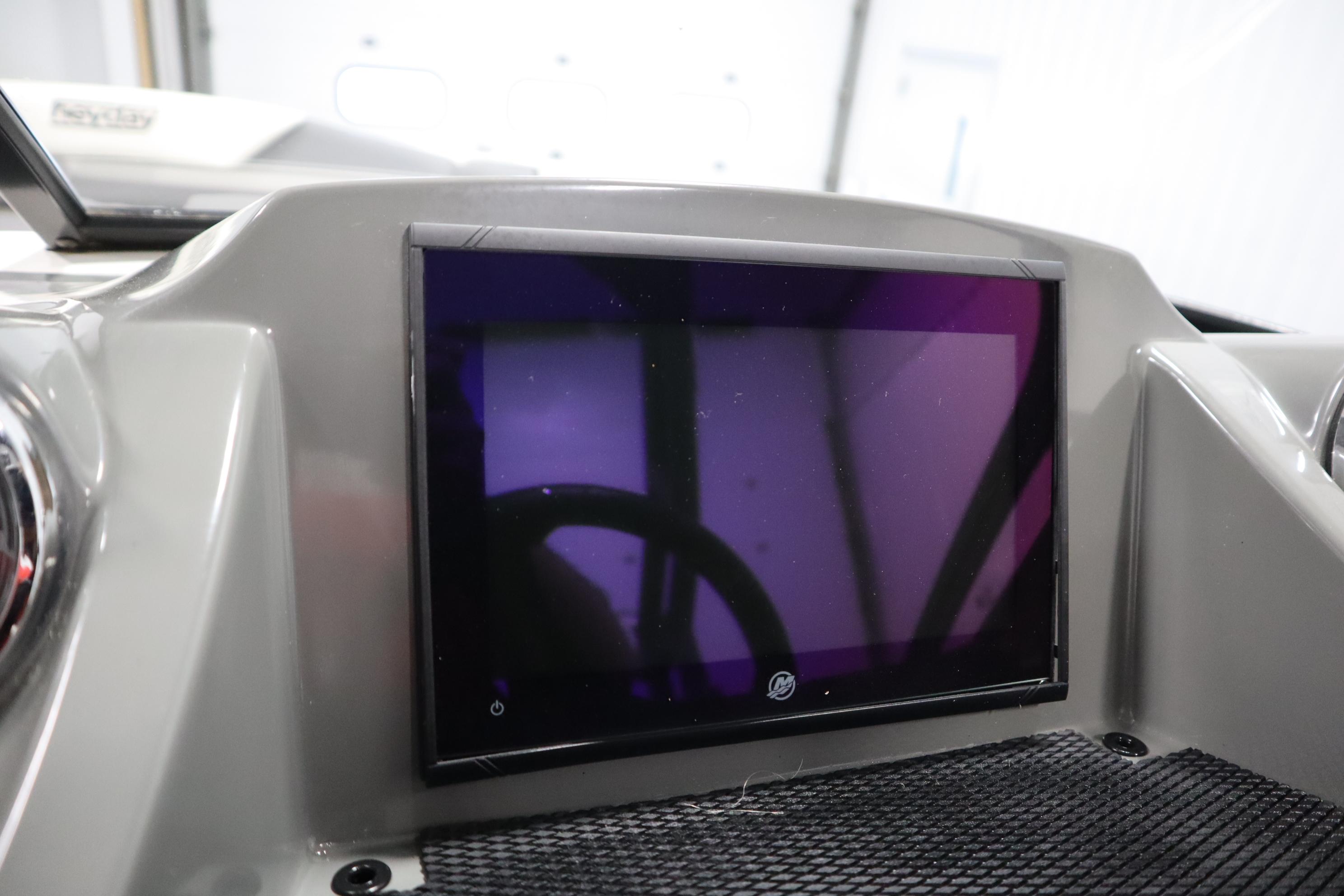 Dashboard display of 2023 Heyday WT Surf boat, featuring a sleek touchscreen interface.
