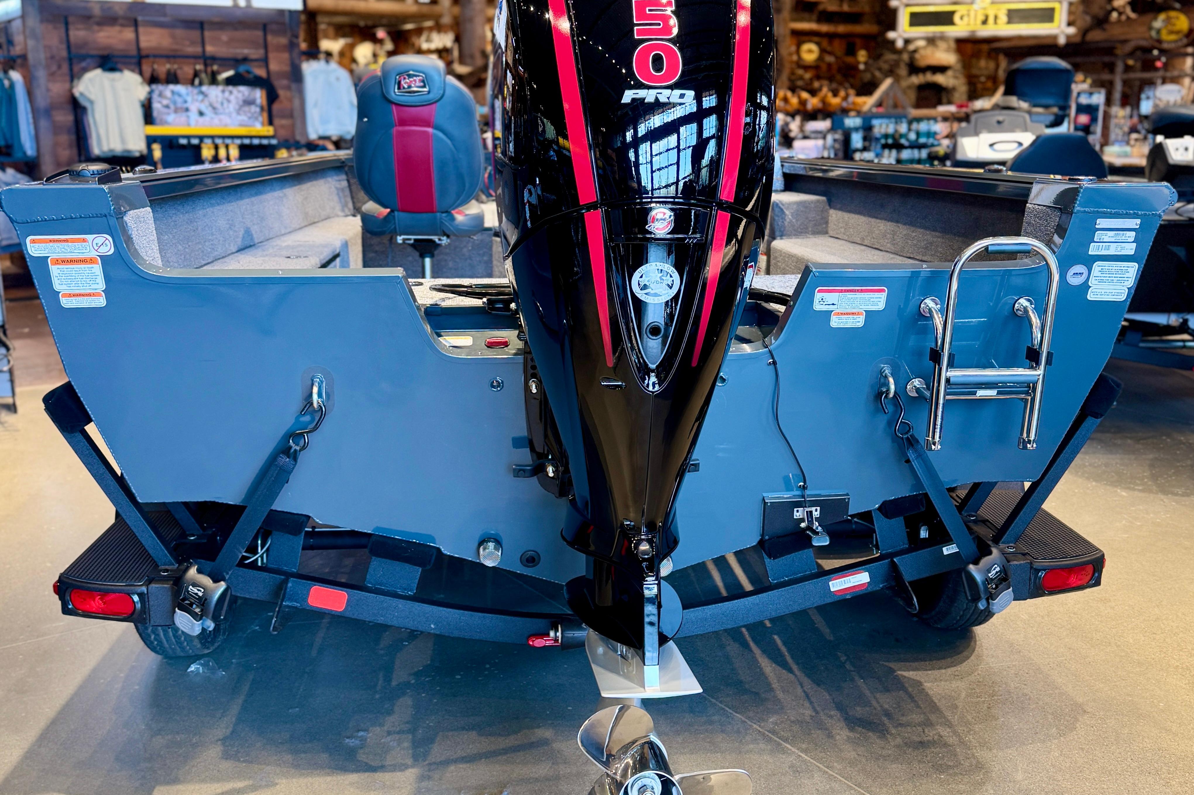 2025 Ranger VS1882SC Angler boat with powerful engine and sleek design in showroom.