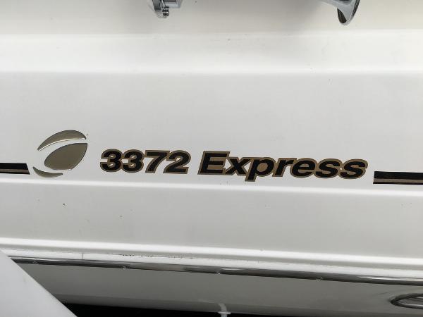 Cruisers Yachts 3372 Express boat, 2004 model, hull lettering.