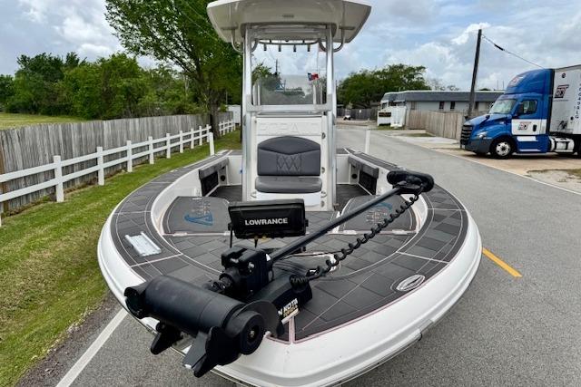 2015 Robalo 226 Cayman boat with Lowrance equipment on a road.