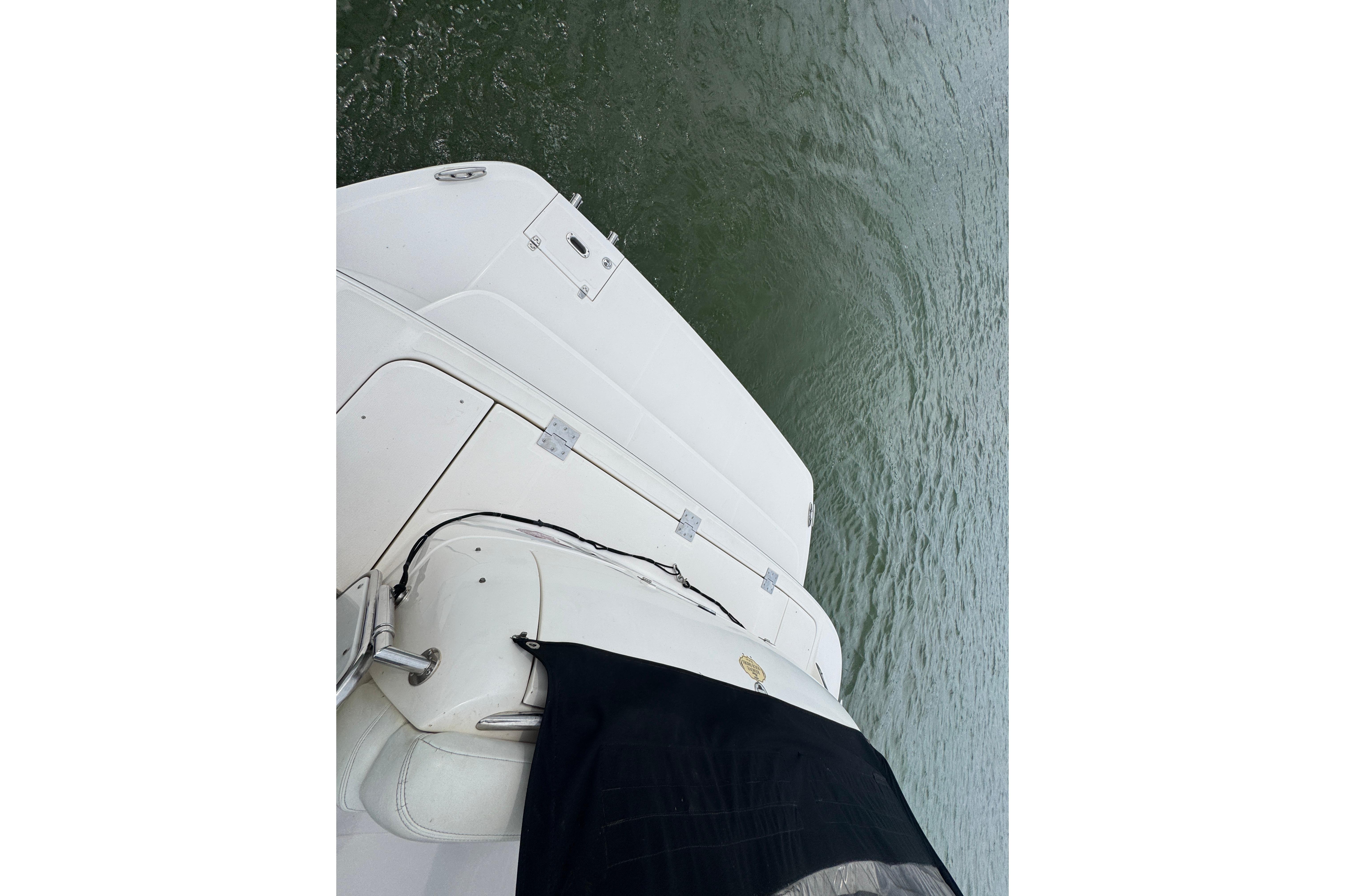 2005 Regal Commodore 4260 yacht deck view over water.