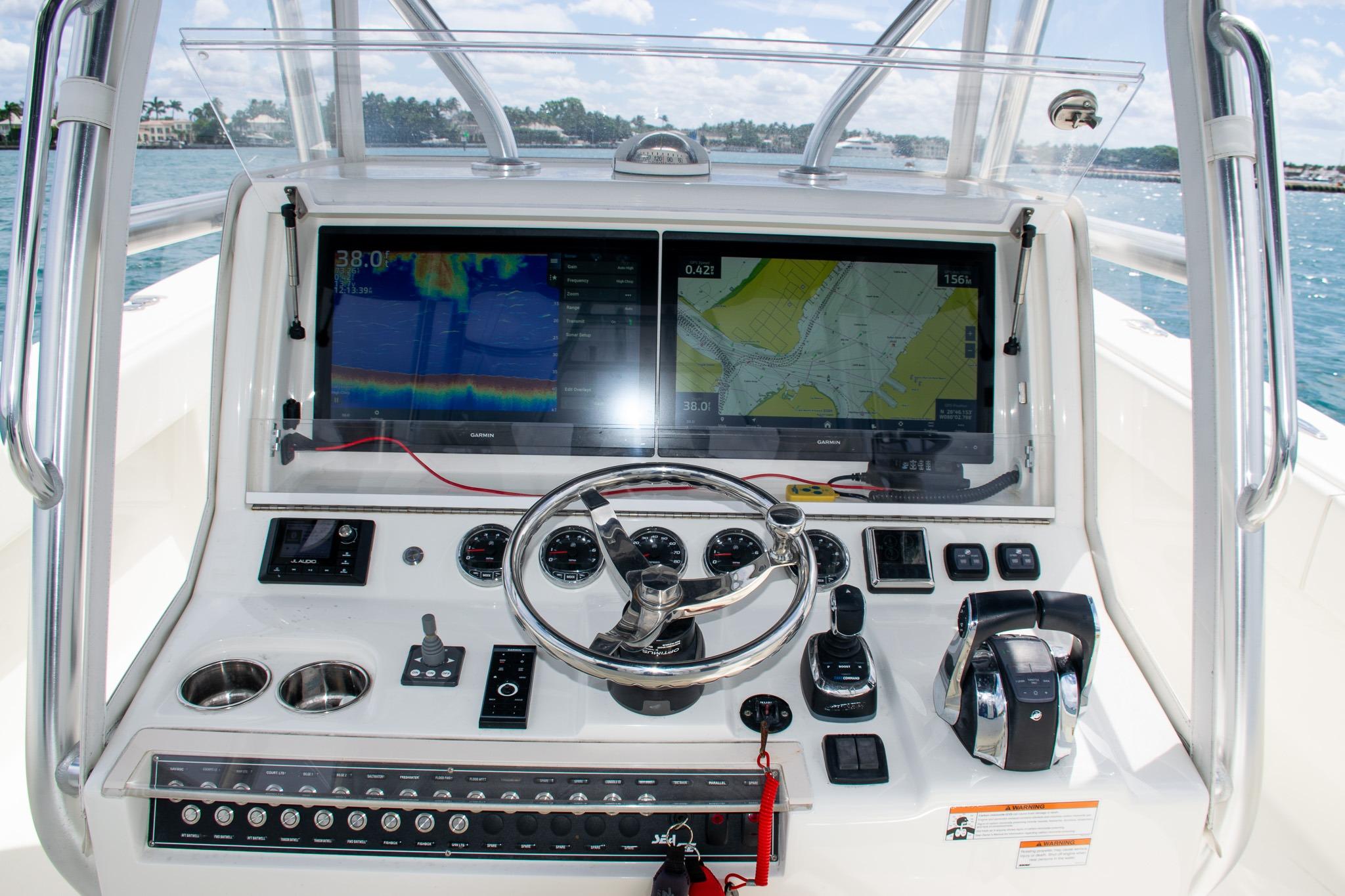 2022 SeaVee 390Z boat dashboard with navigation screens and controls.
