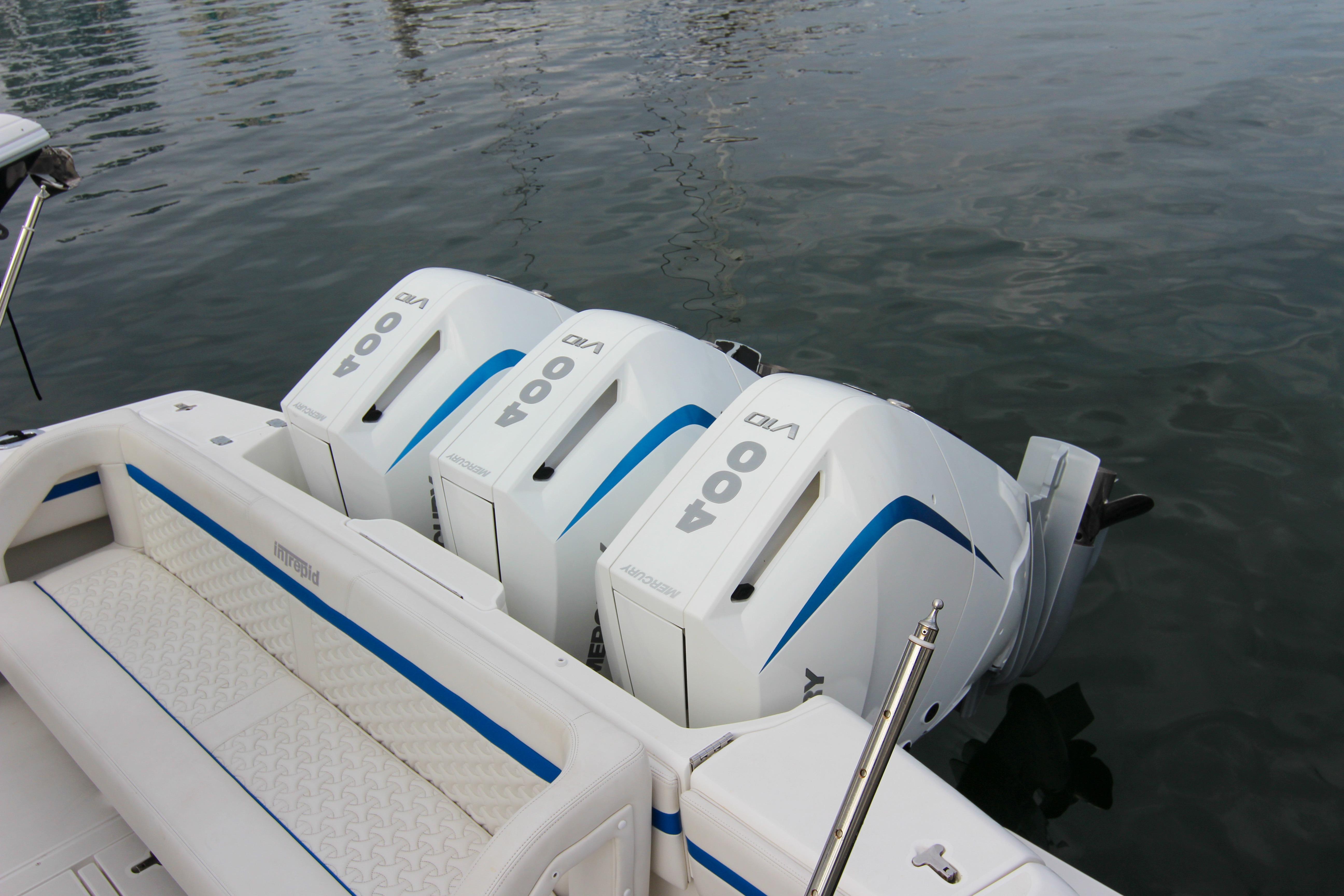 2003 Intrepid 377 Walkaround with triple 400 V8 outboard engines on calm water.