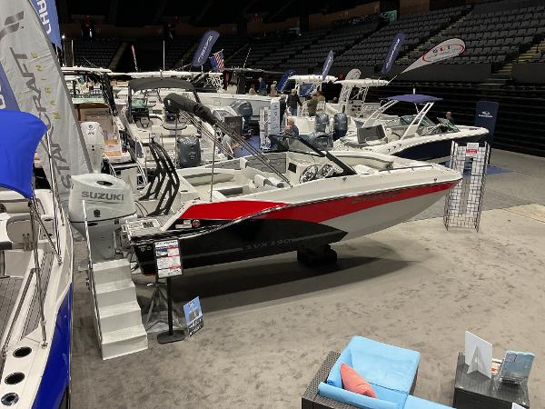2024 Starcraft SVX 190 OB DC boat on display at an indoor boat show.