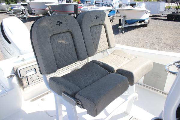 2023 Sea Pro 239 Center Console boat seats with quilted design and logo.