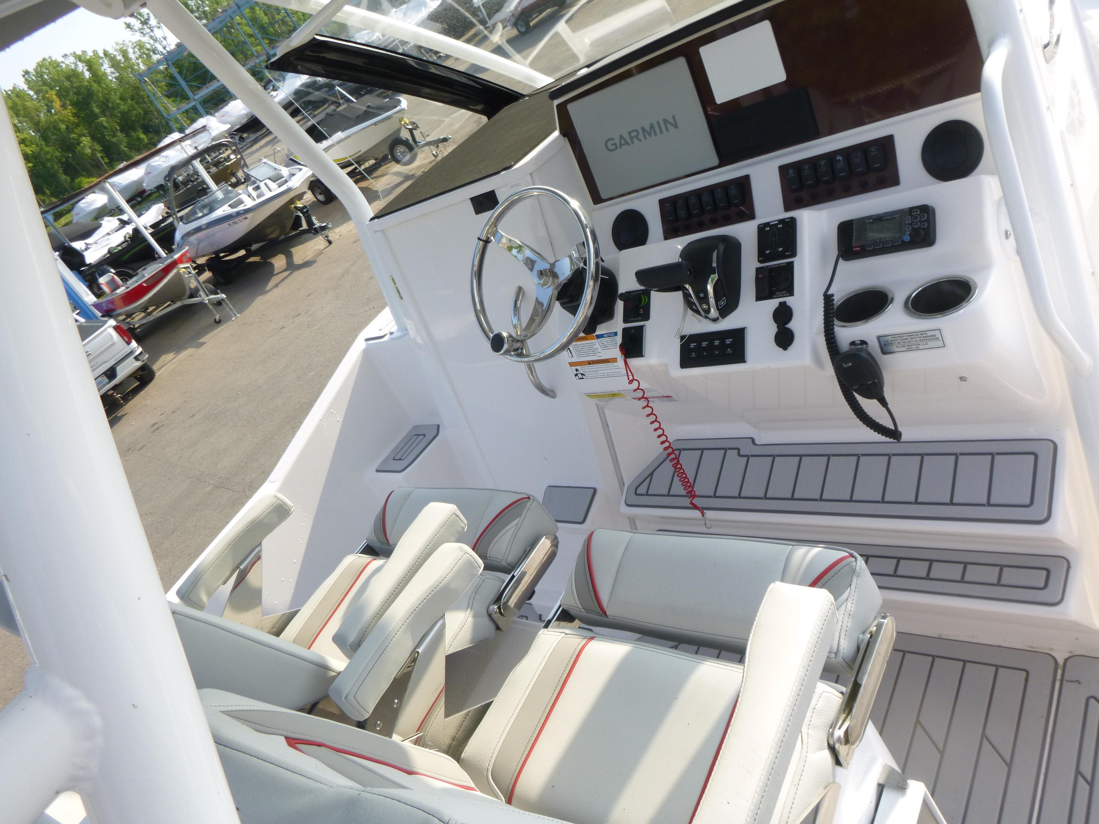 Interior of 2025 Solara S-250 CW boat with advanced navigation controls and seating.