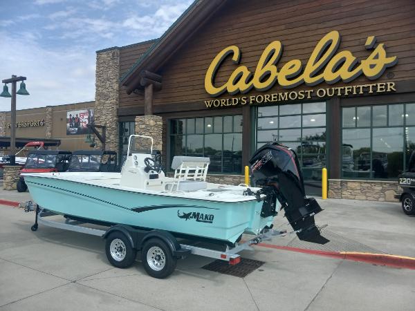 2024 Mako Pro Skiff 19 CC boat on trailer outside Cabela's store.