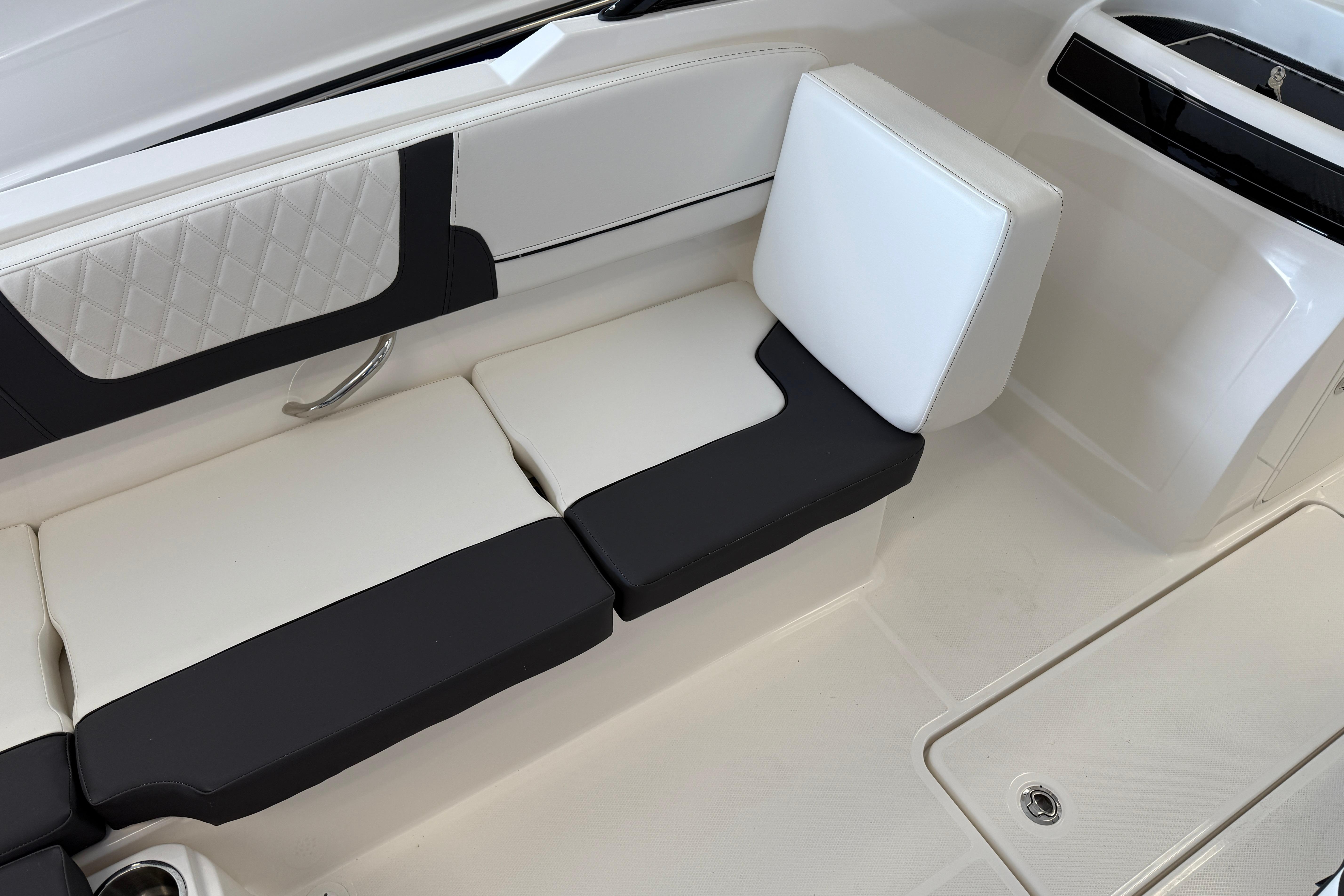 2025 Bayliner VR4 Bowrider OB interior seating with modern black and white design.