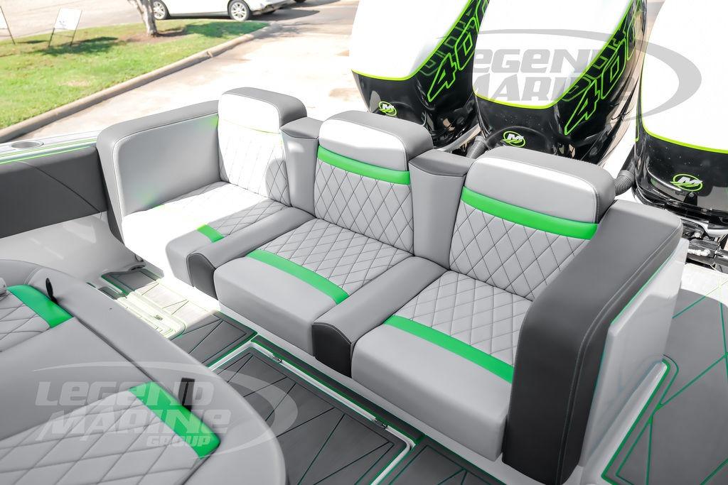 Luxurious seating on 2024 Statement 350 Open boat with stylish green accents and powerful engines.