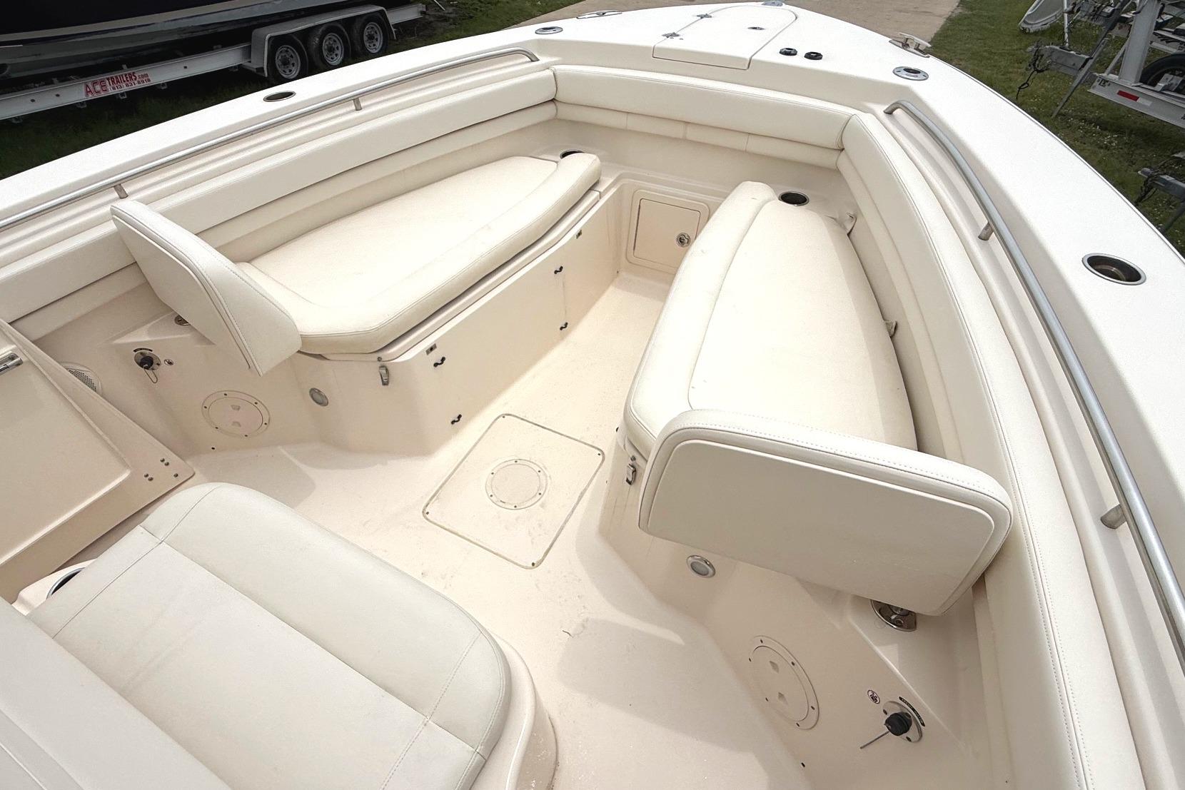 2018 Grady-White Canyon 306 boat interior with spacious seating and storage compartments.