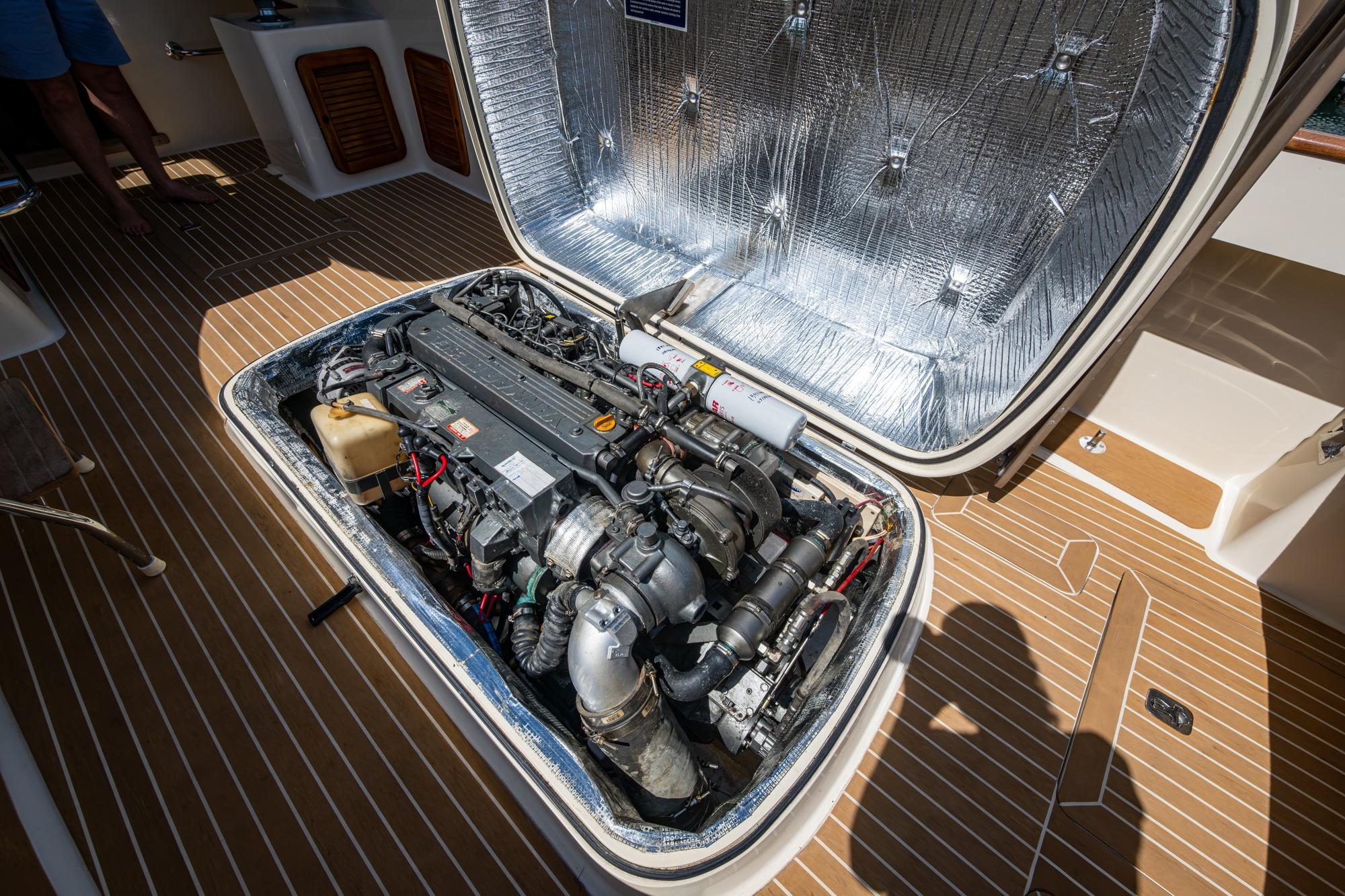 Engine compartment of a 2001 Hinckley Picnic Boat Classic, showcasing detailed mechanical components.