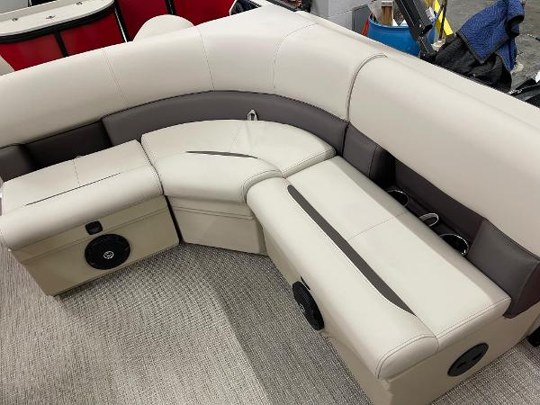 2025 Bentley Pontoons 200 Fish-N-Cruise interior seating with beige upholstery and built-in speakers.