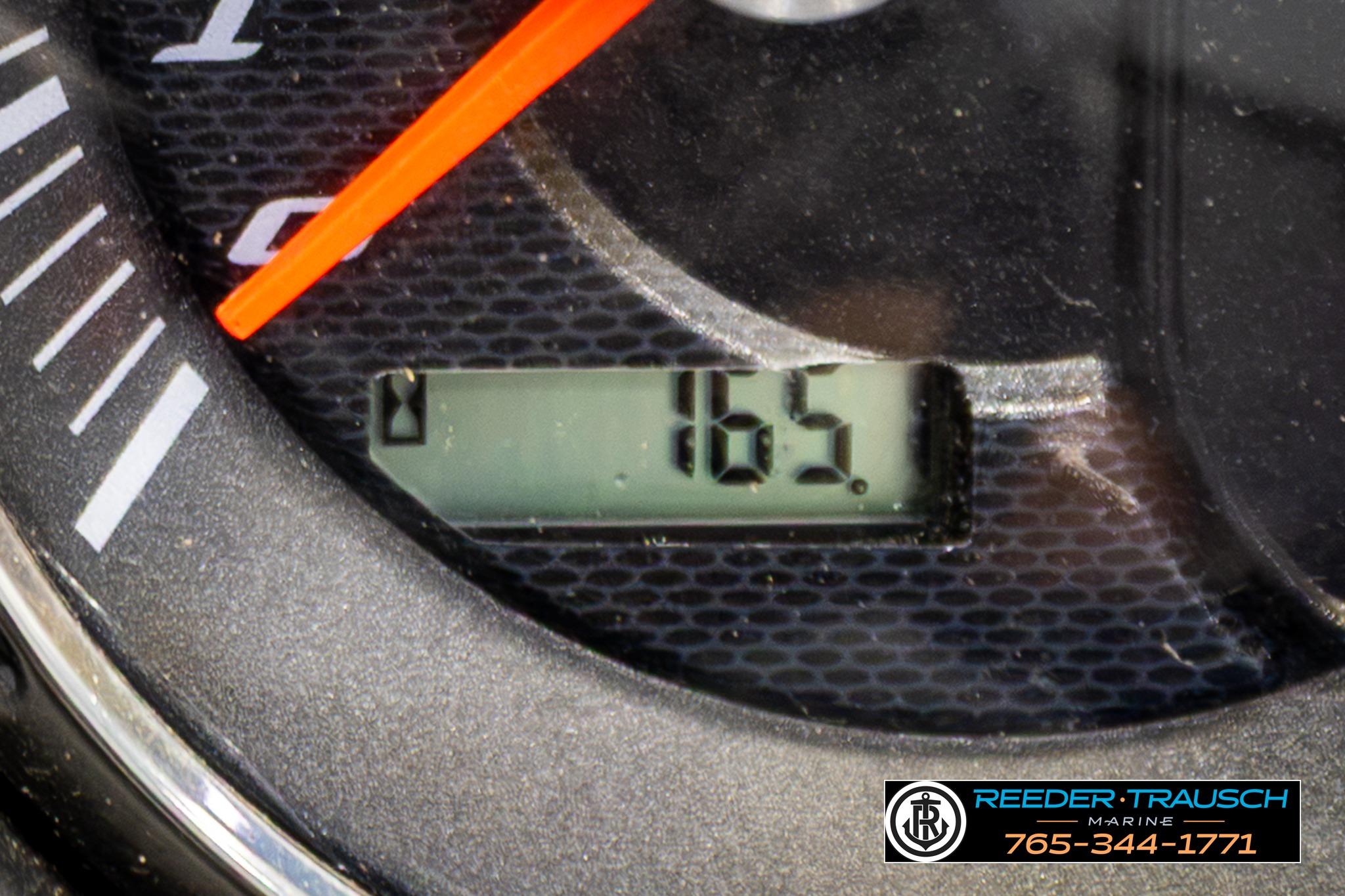 Close-up of a 2019 Manitou Oasis SR VP speedometer displaying 165 hours.
