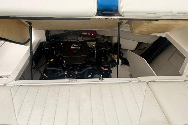 Engine compartment of a 2007 Regal 2200 Bowrider boat, showcasing the engine and interior details.