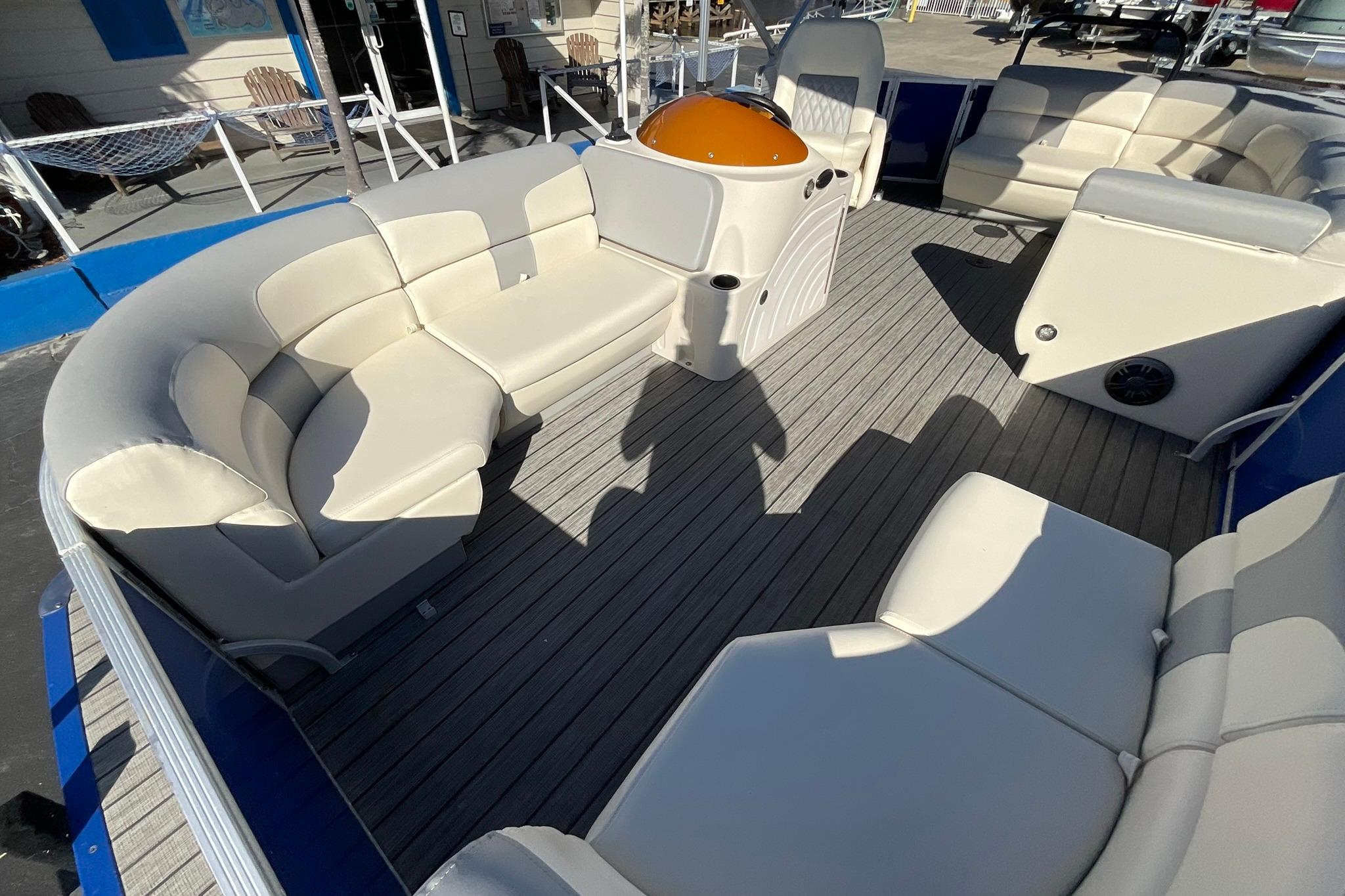 Luxurious seating on a 2021 Lexington 318 3 Series pontoon boat deck.