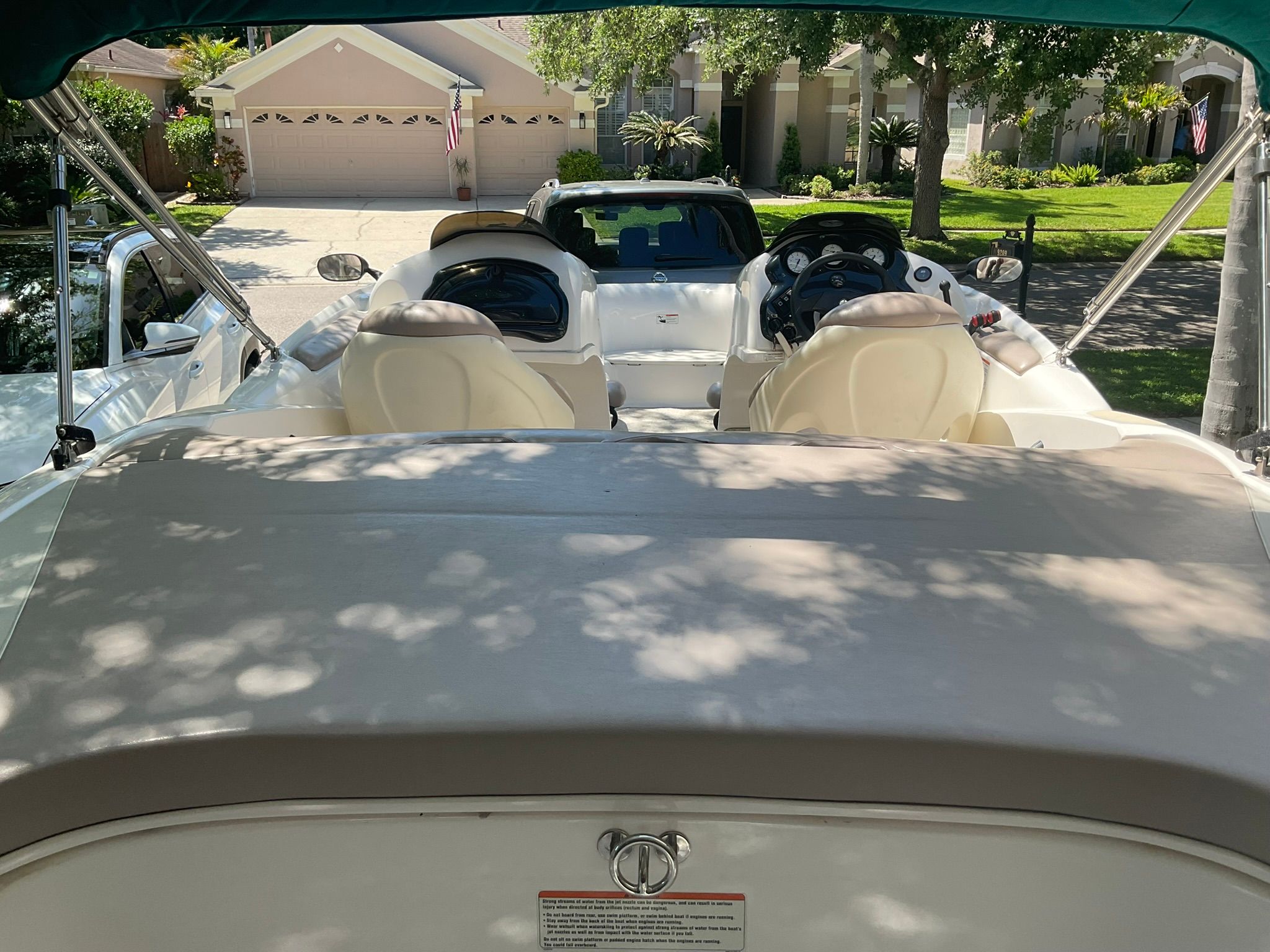 2000 Yamaha LS2000 boat parked in a residential street.