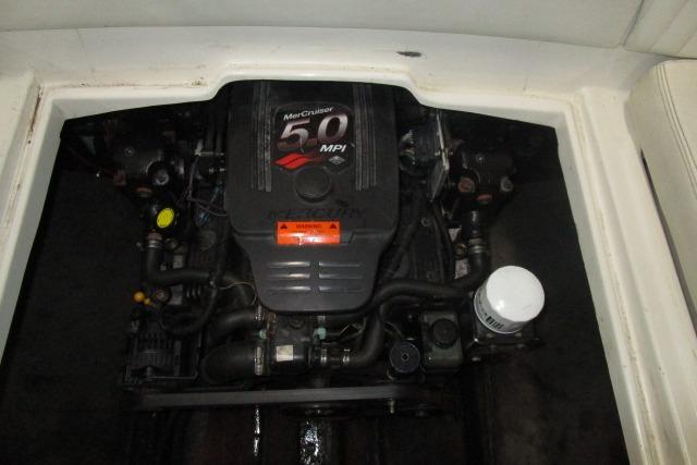 Engine compartment of a 2004 Stingray 240 LR with MerCruiser 5.0 MPI engine.
