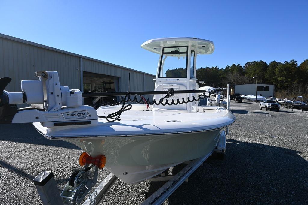 2026 Tidewater 2500 Carolina Bay boat with Minn Kota motor in outdoor setting.