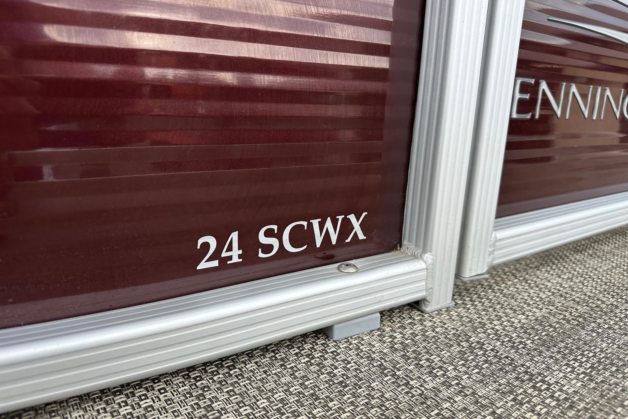 2016 Bennington 24 SCWX boat model detail with maroon and silver accents.