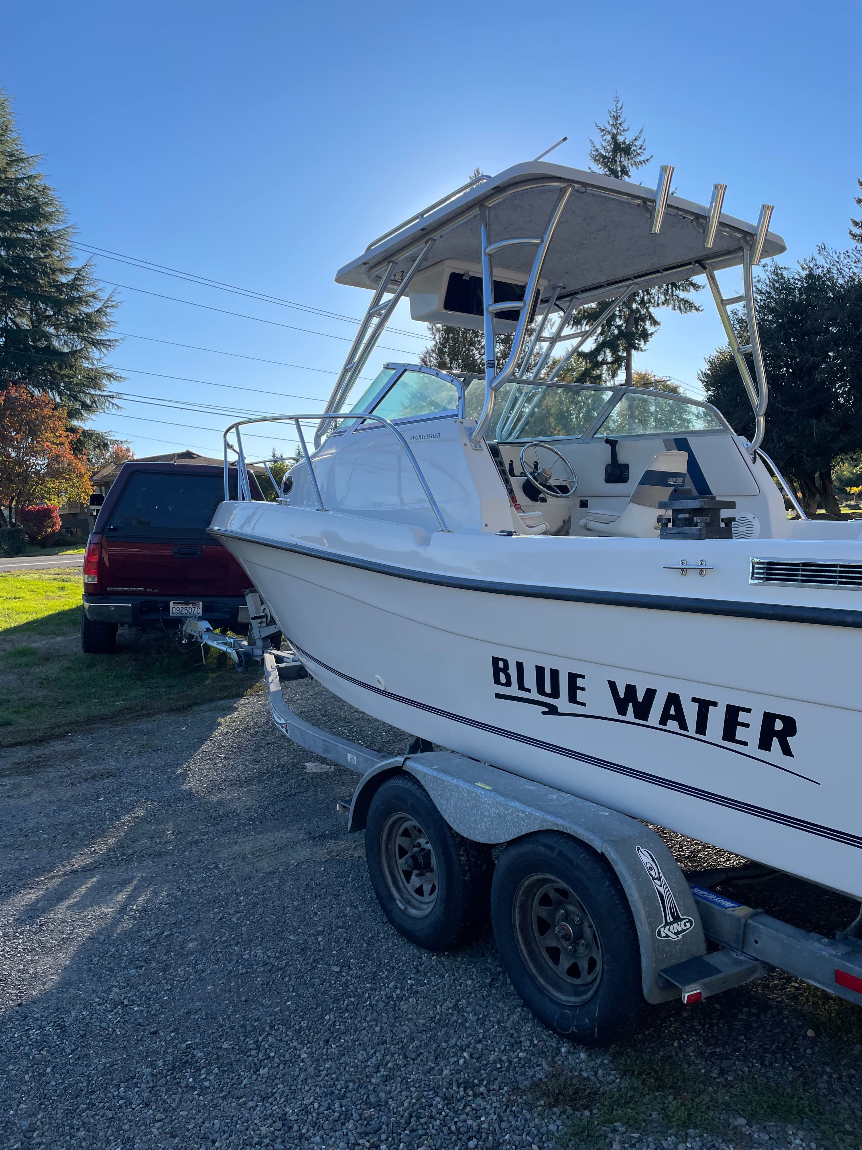 2001 Bluewater 2100 Sport Fisher on a trailer, ready for adventure.