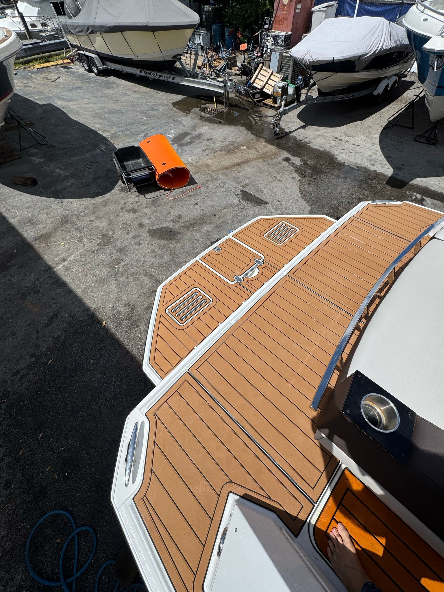 Monterey 360 Sport Coupe 2015 at shipyard with wooden deck.