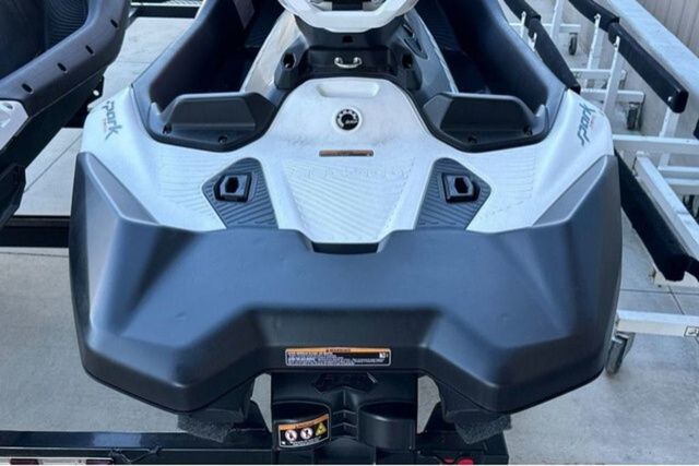 Sea-Doo PWC SPARK TRIXX 90 AUD WH 3UP IBR 26 from 2026 on a trailer.