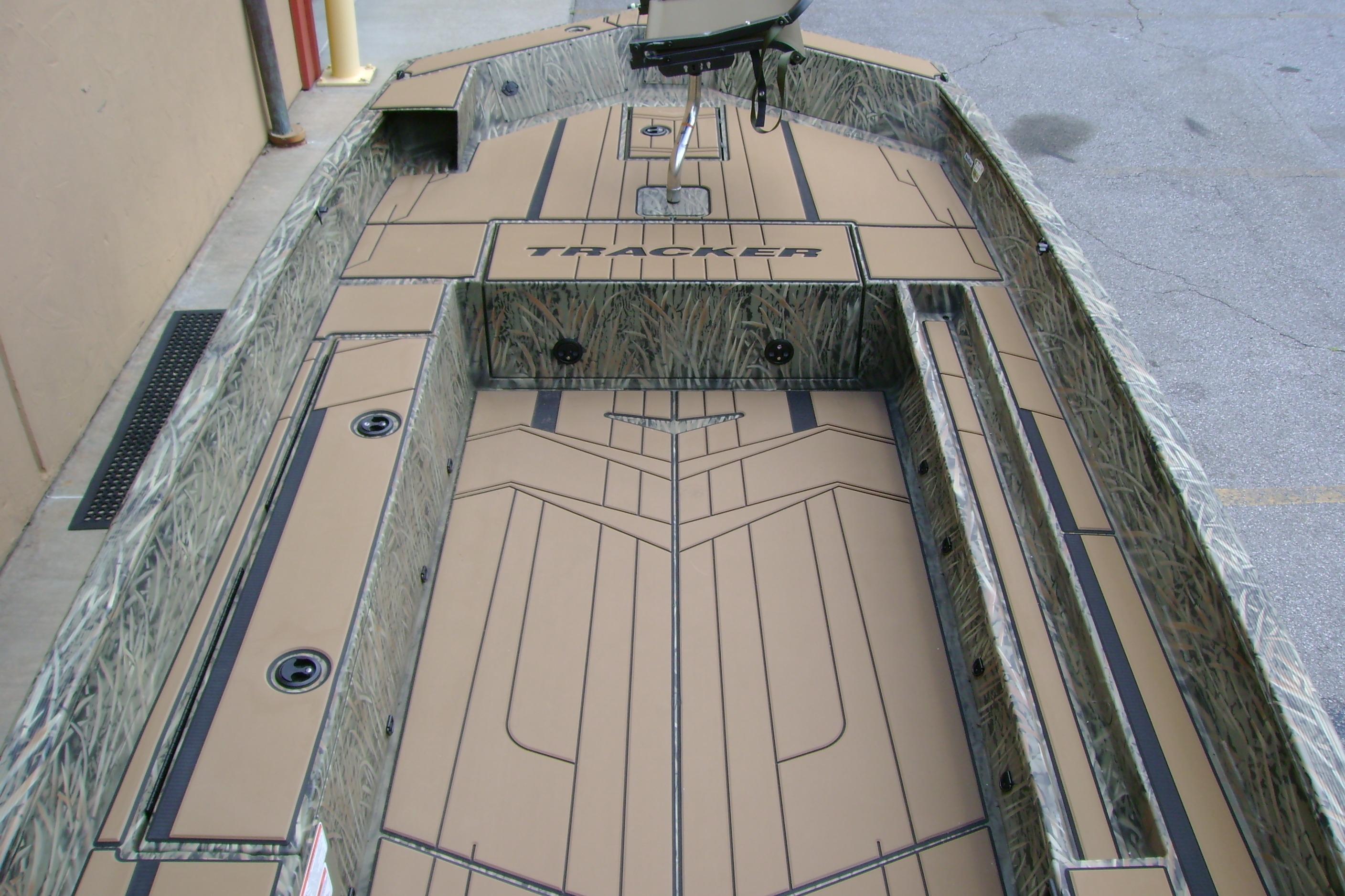 2026 Tracker Grizzly 1756 T Marsh boat interior with camo design and spacious deck.
