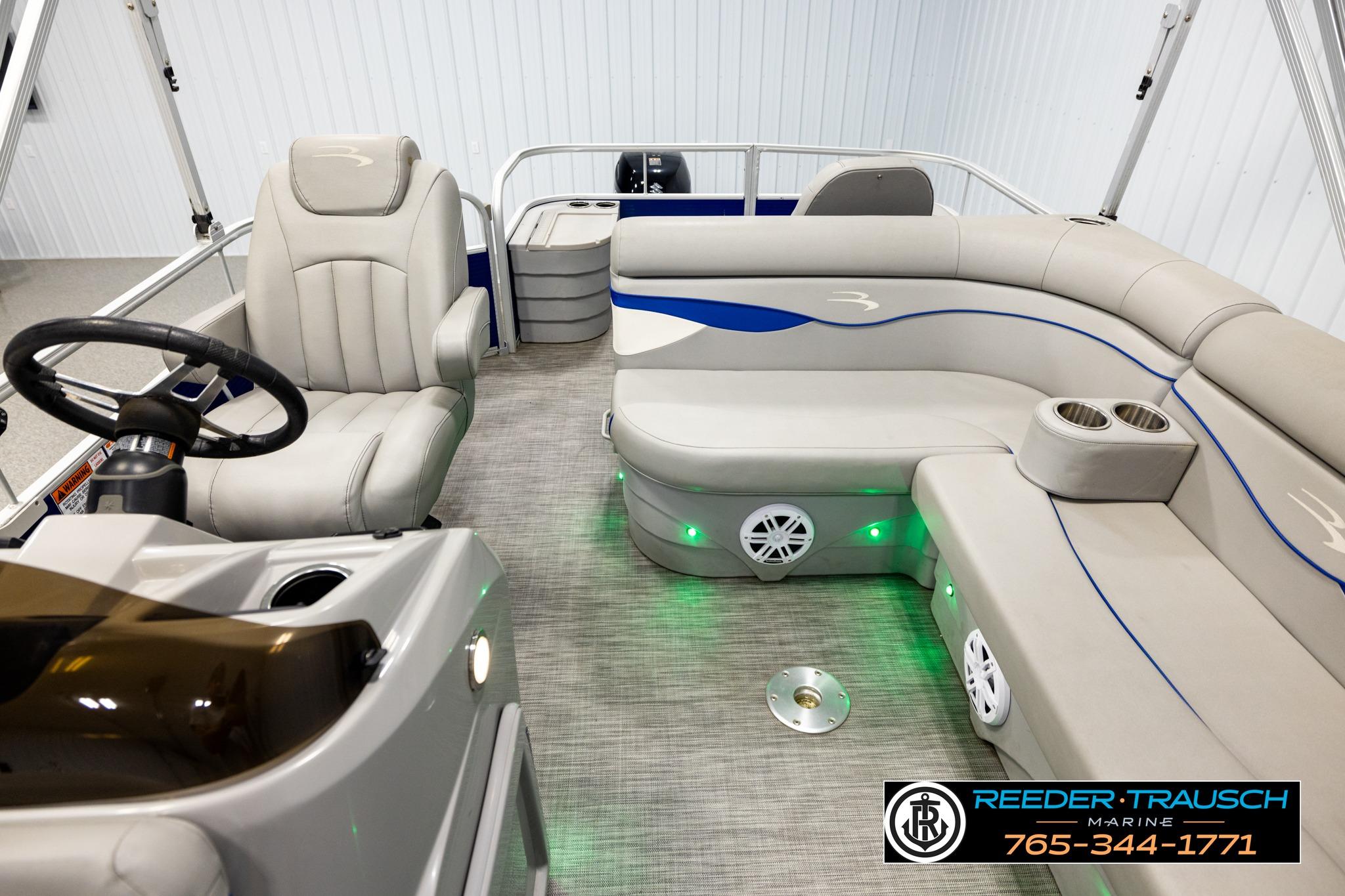 Interior of a 2021 Bennington 20 SV pontoon boat with plush seating and modern design.