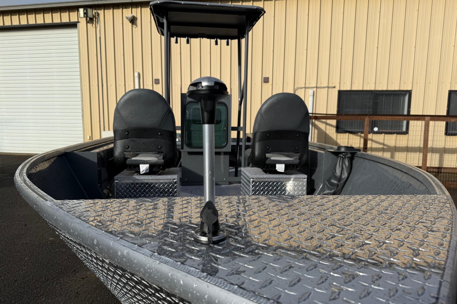 2026 Fish Rite Angler 18 boat with dual seats and diamond plate flooring.