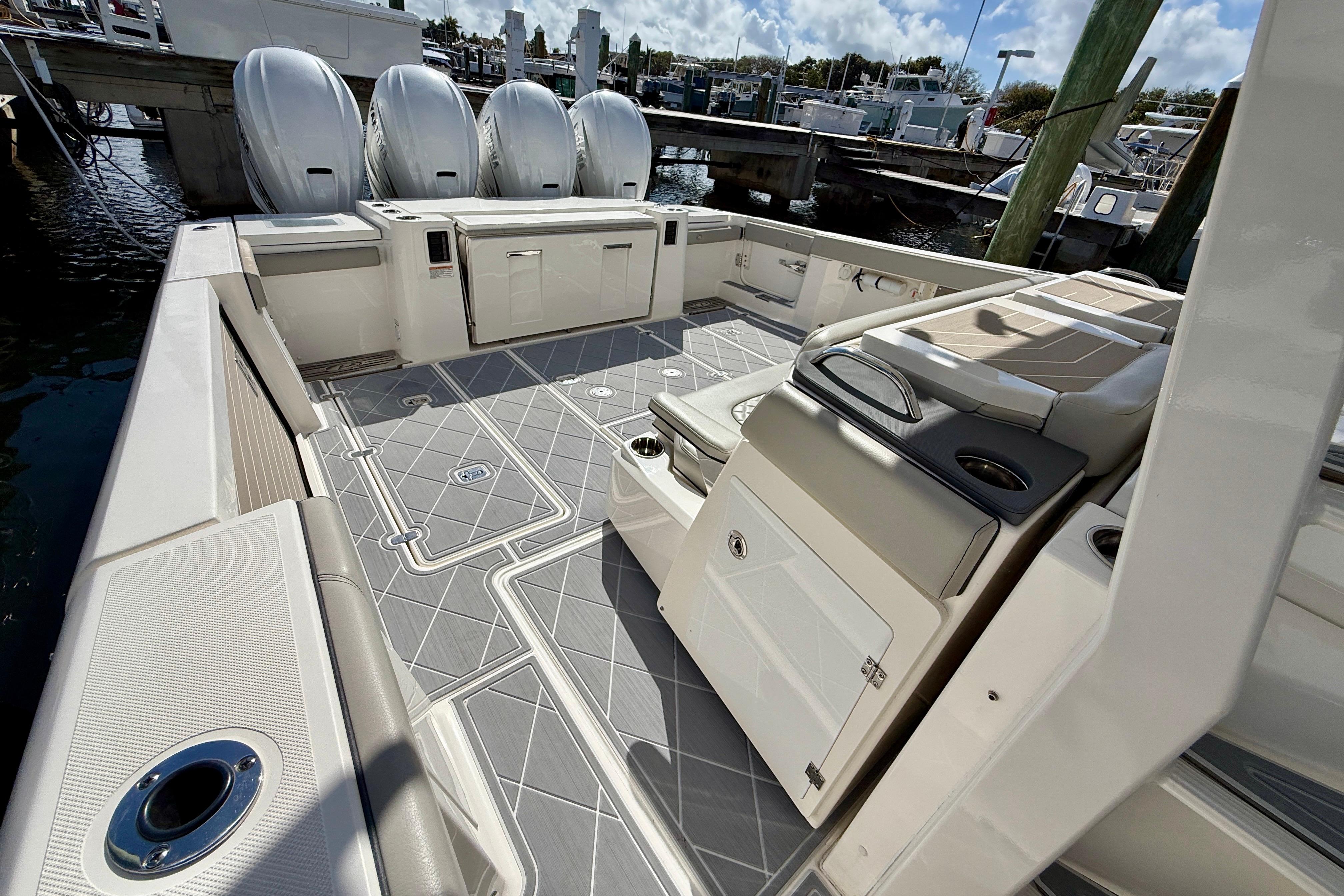 2022 Pursuit S 428 Sport boat interior with spacious deck and seating area.