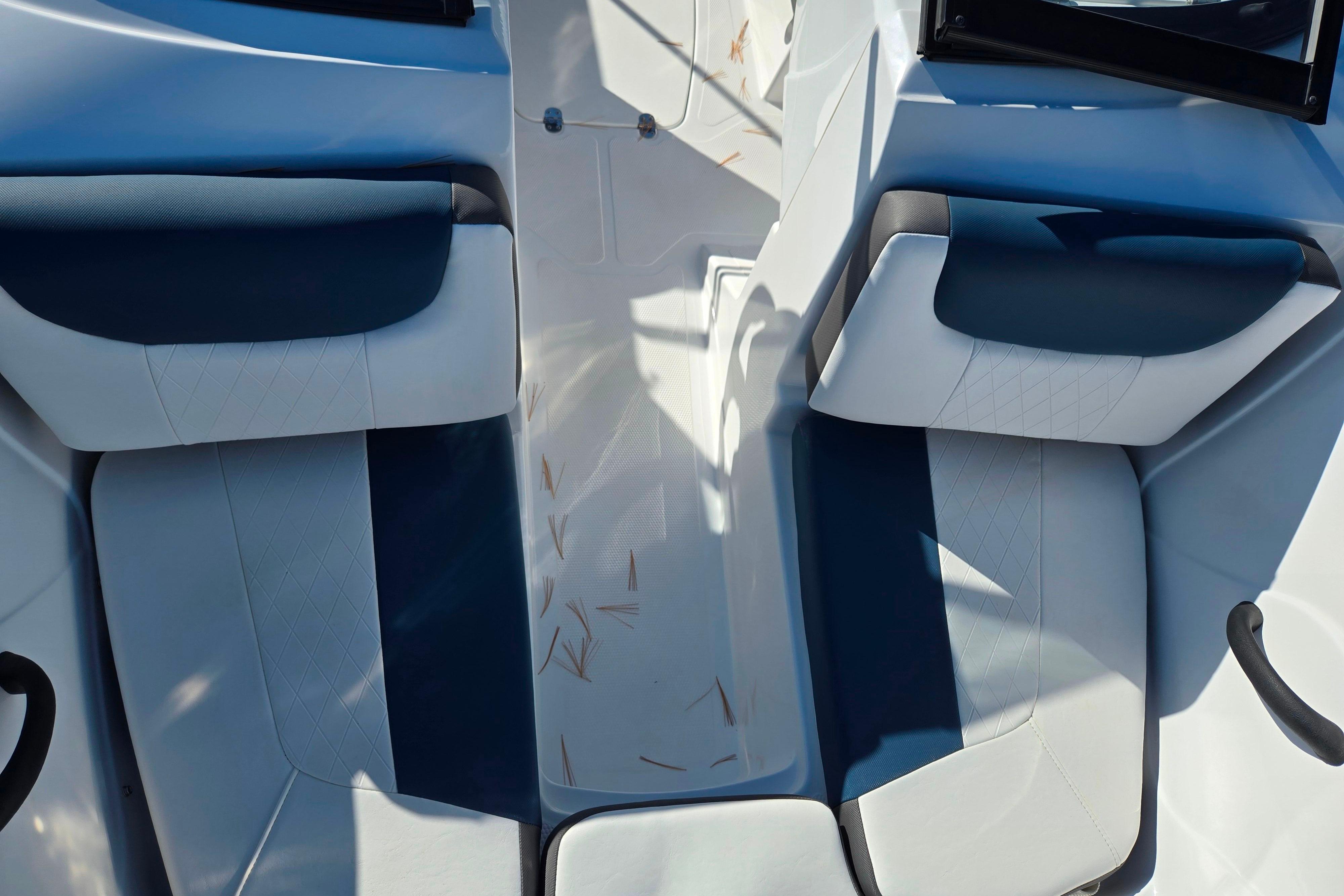 2023 Tahoe 185 S boat interior with white and blue seating.