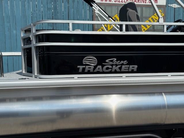2026 Sun Tracker Fishin' Barge 20 DLX pontoon boat, black exterior, side view.