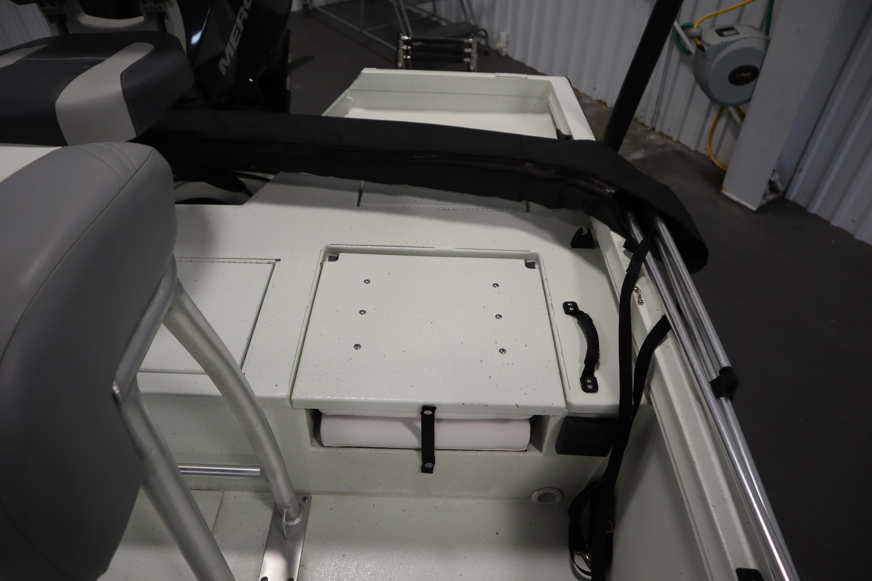 2022 Crestliner 2200 CC boat interior with seating and storage compartments.
