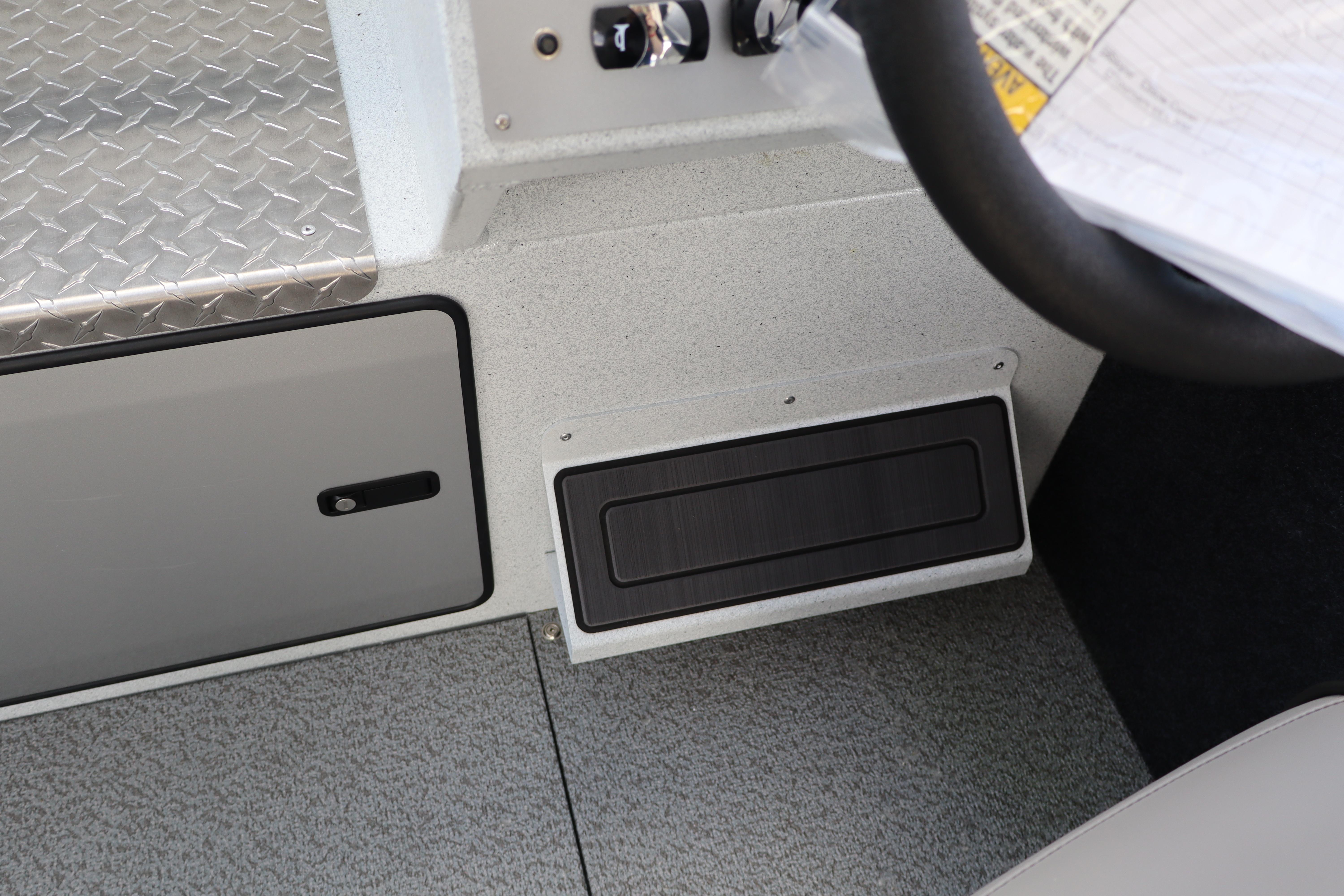 Interior view of 2026 KingFisher 2425 Escape HT boat dashboard and controls.