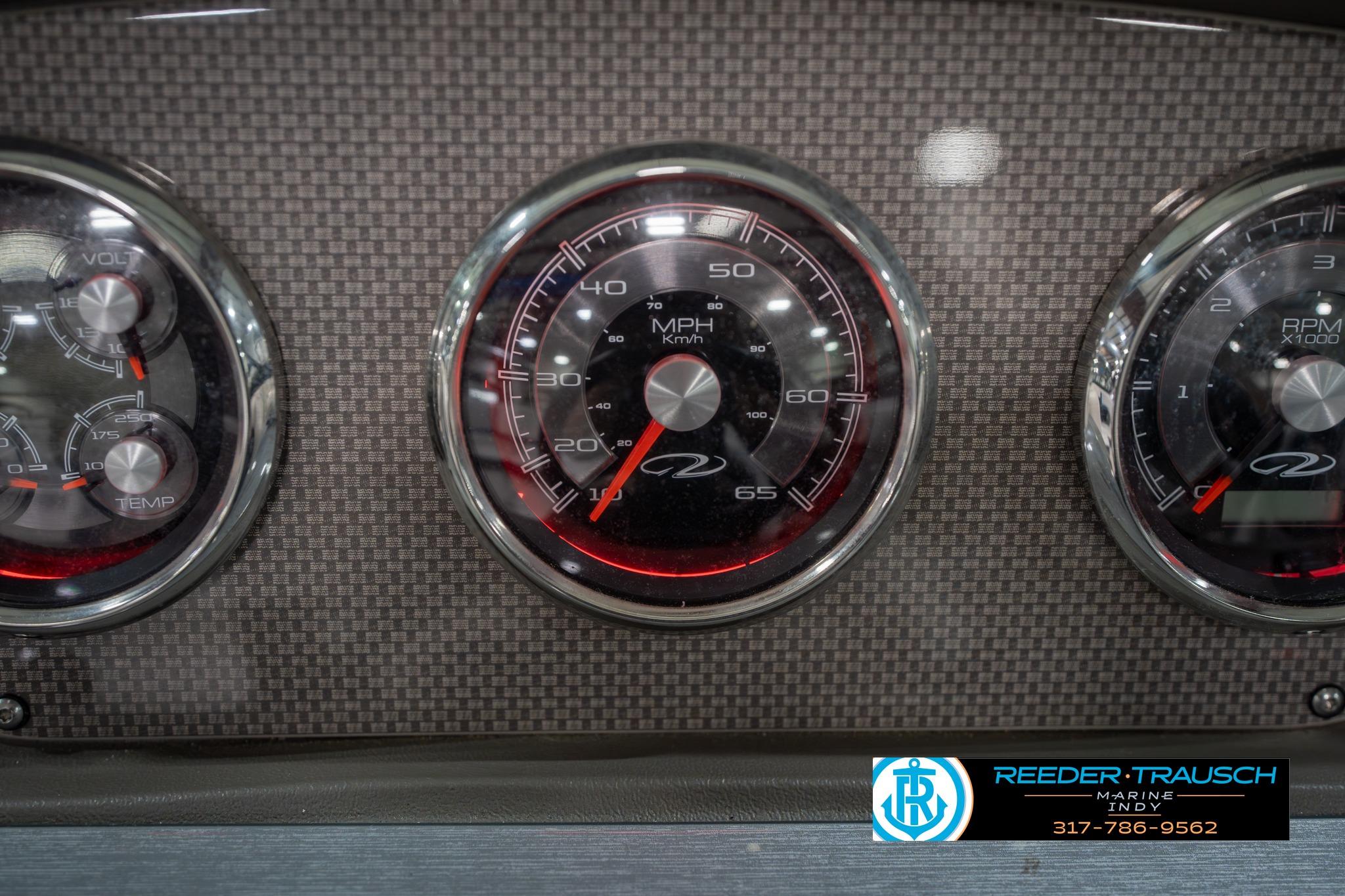 Dashboard gauges of a 2015 Regal 2000 ESX Bowrider boat.