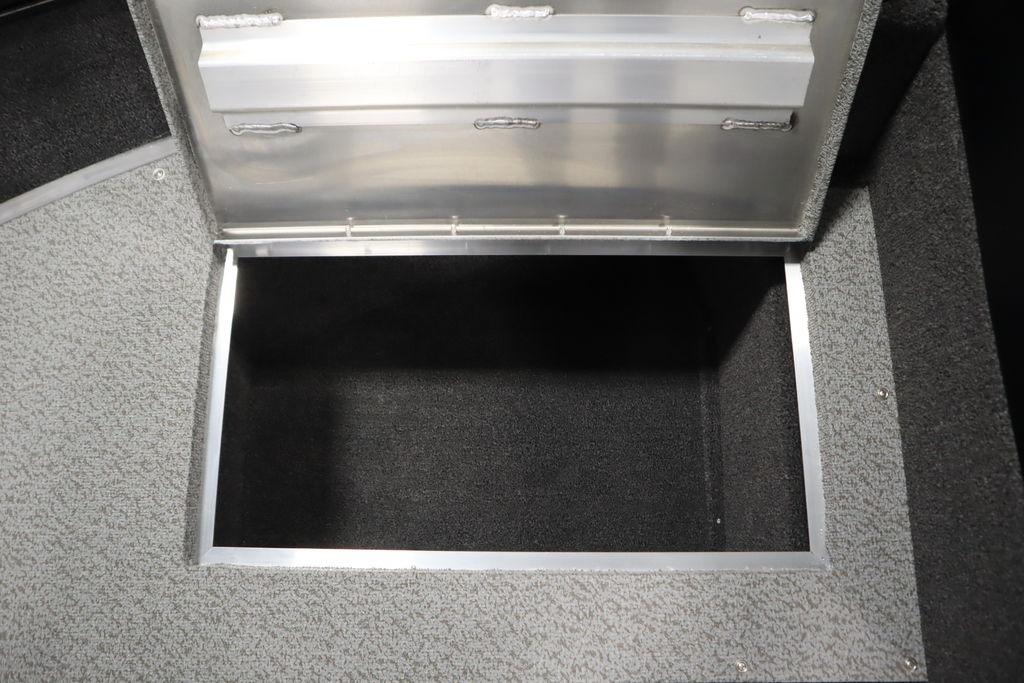 Open storage compartment in 2026 Lowe Fishing Machine 175 boat.
