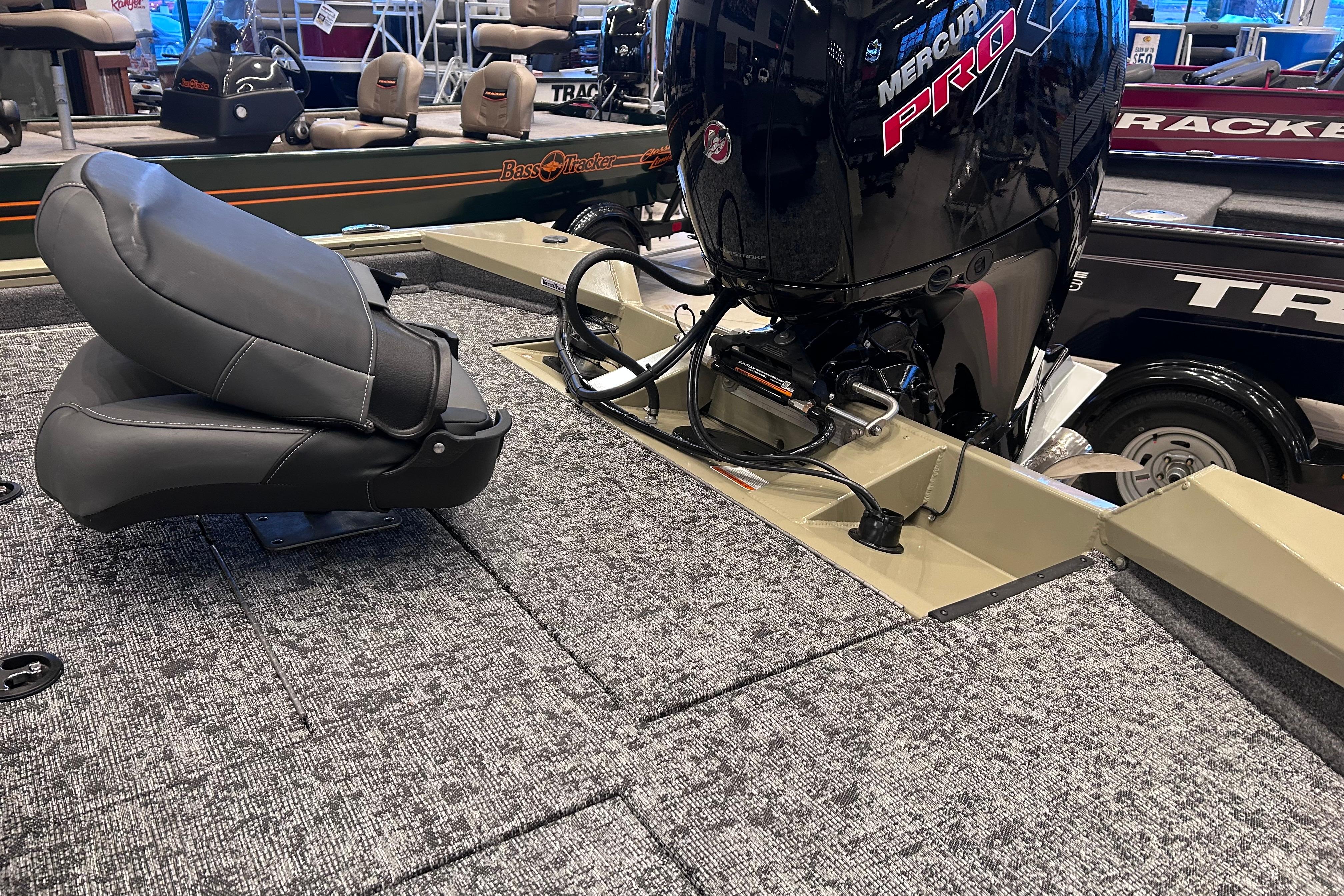 2026 Tracker Pro Team 195 boat interior with Mercury Pro engine and seating.