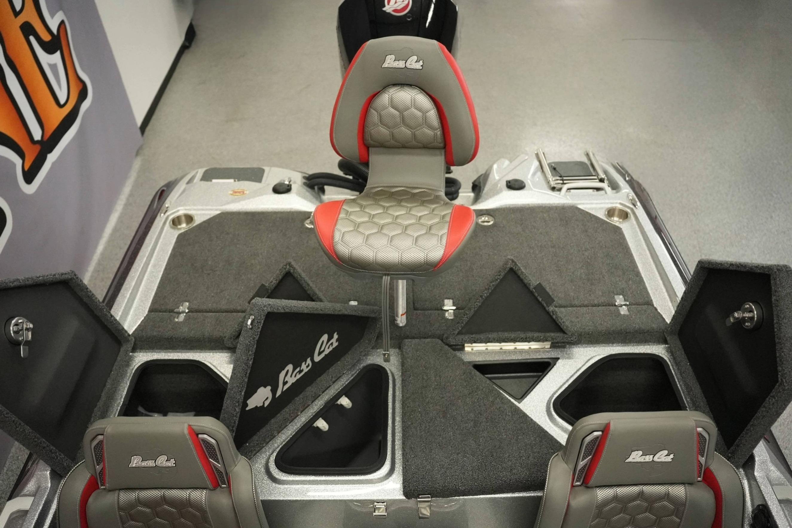 2026 Bass Cat Lynx STS boat interior with storage compartments and seating.