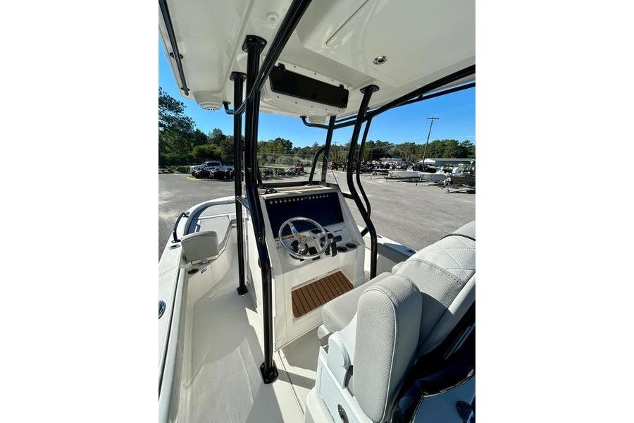 2026 Ranger 2360 Bay boat interior with steering console and seating.