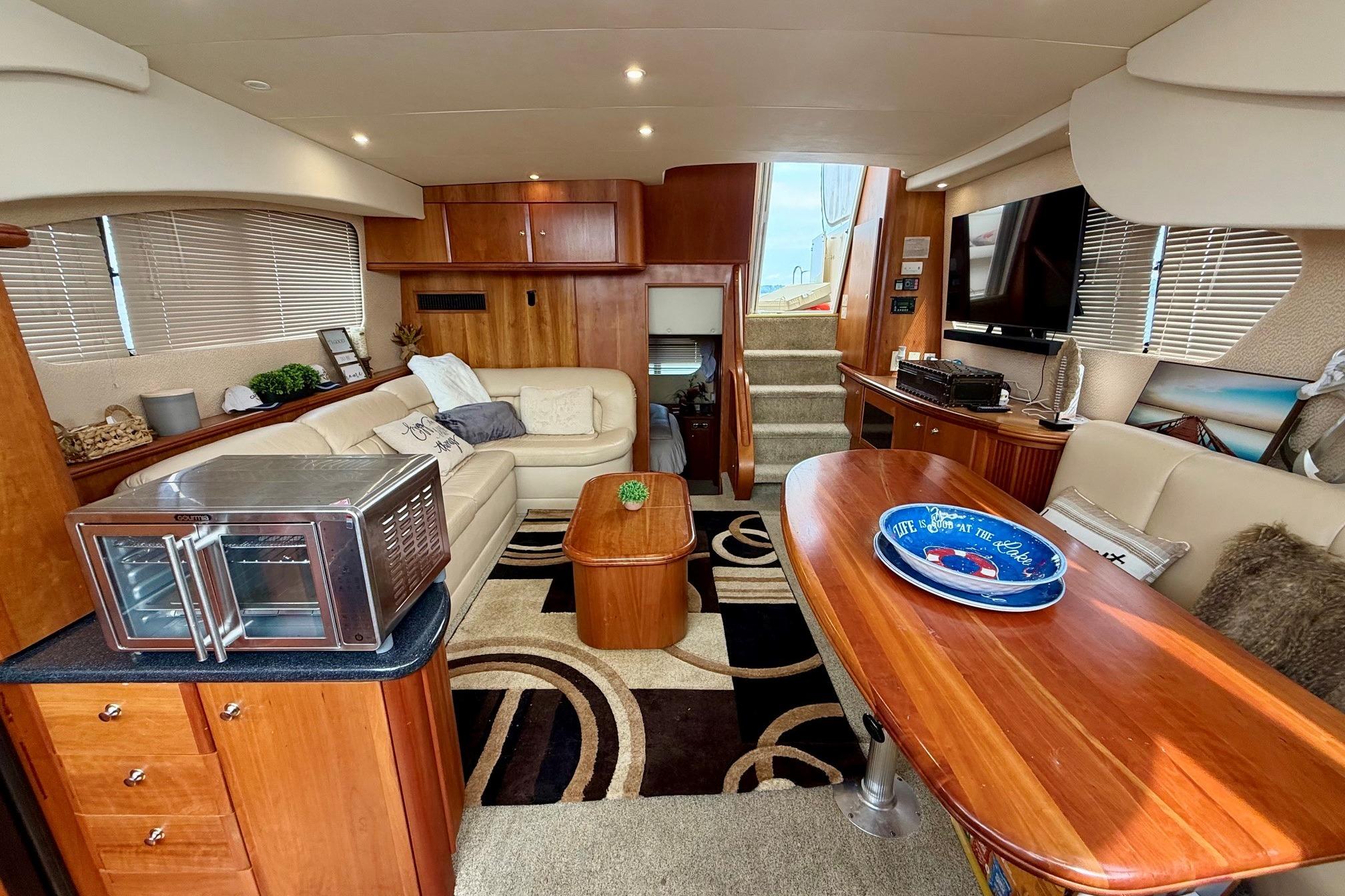 Luxurious interior of a 2004 Silverton 39 Motor Yacht with elegant furnishings and modern amenities.