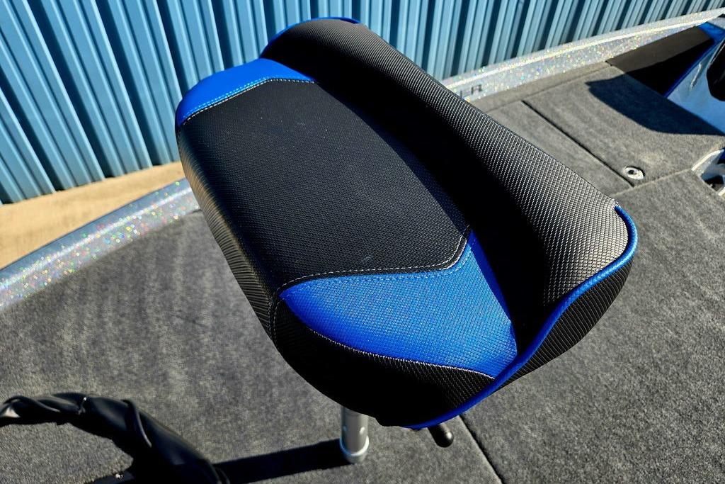 Skeeter ZXE20 2026 boat seat with blue and black design on deck.