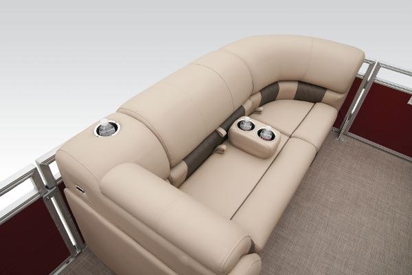 2024 Sun Tracker Party Barge 20 DLX beige seating with cup holders.