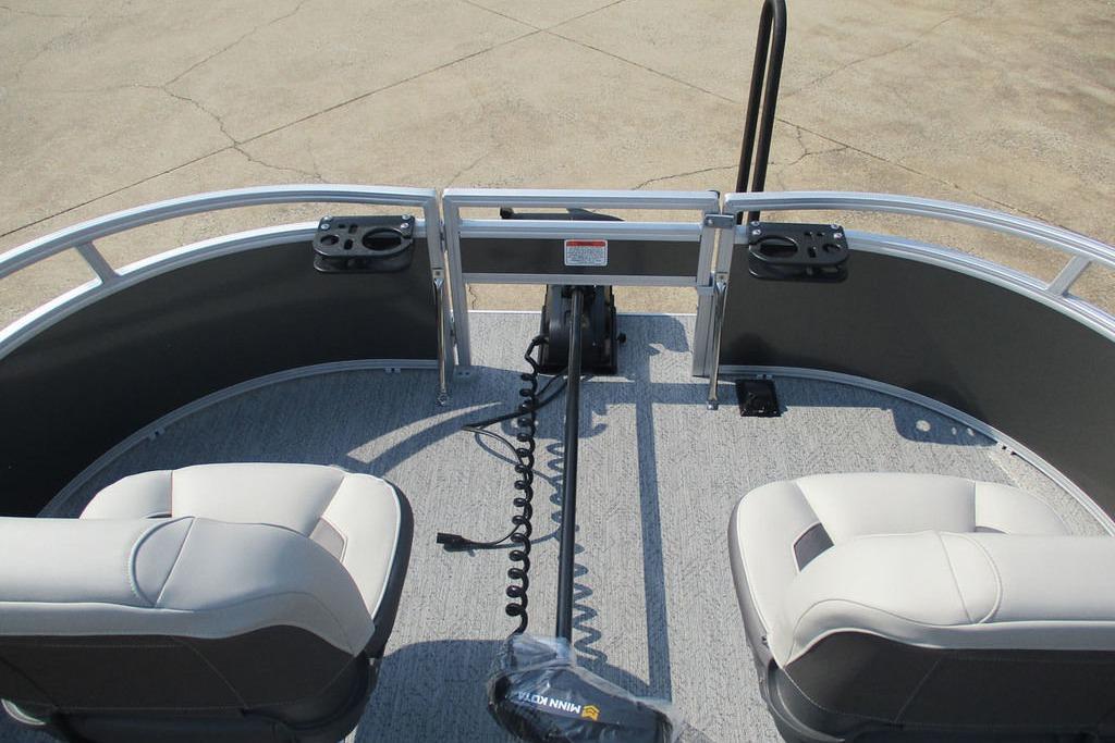 2026 Sun Tracker Bass Buggy 16 XL Select pontoon boat interior with seating and railing.