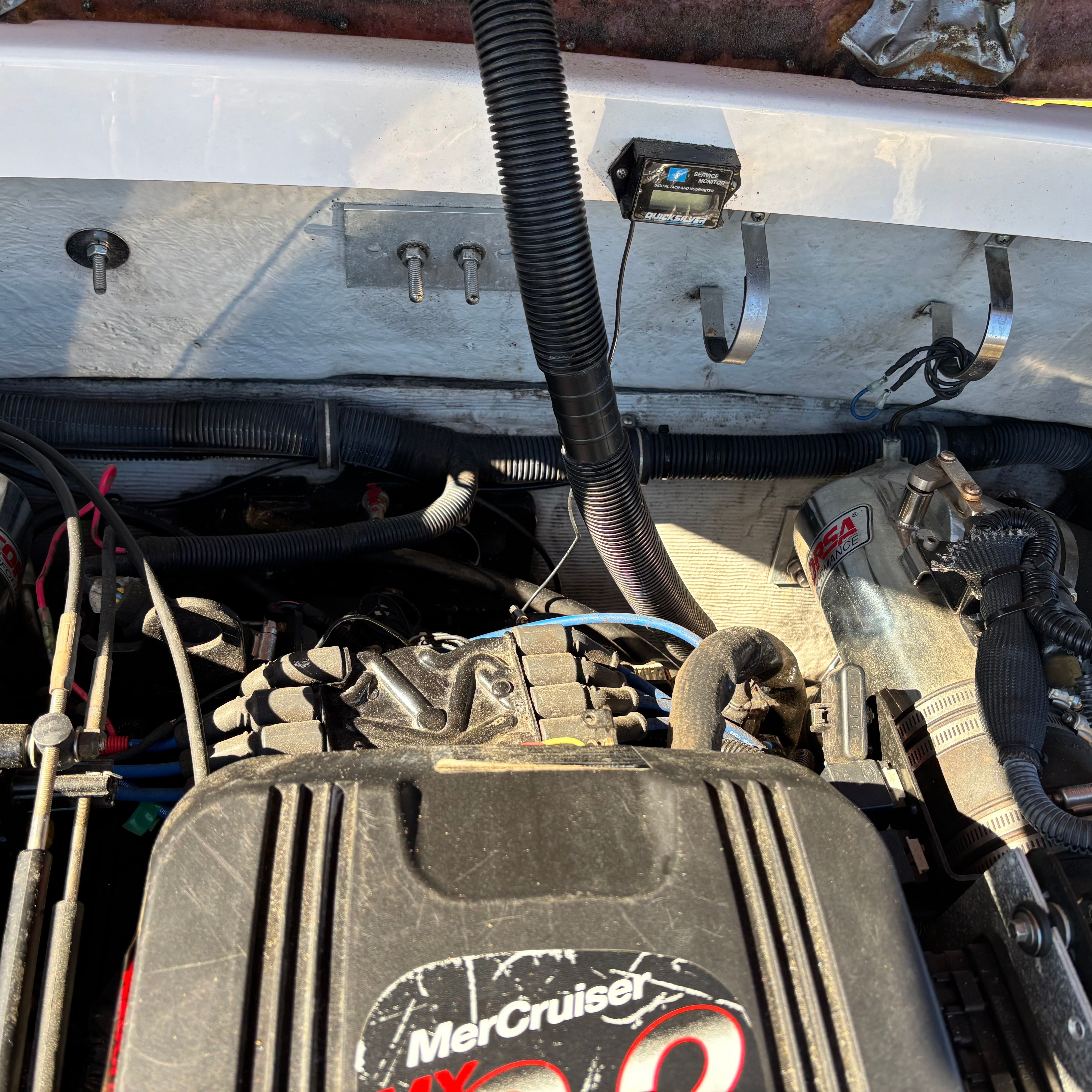 Engine compartment of a 2003 Chris-Craft Launch 22 boat with MerCruiser engine.