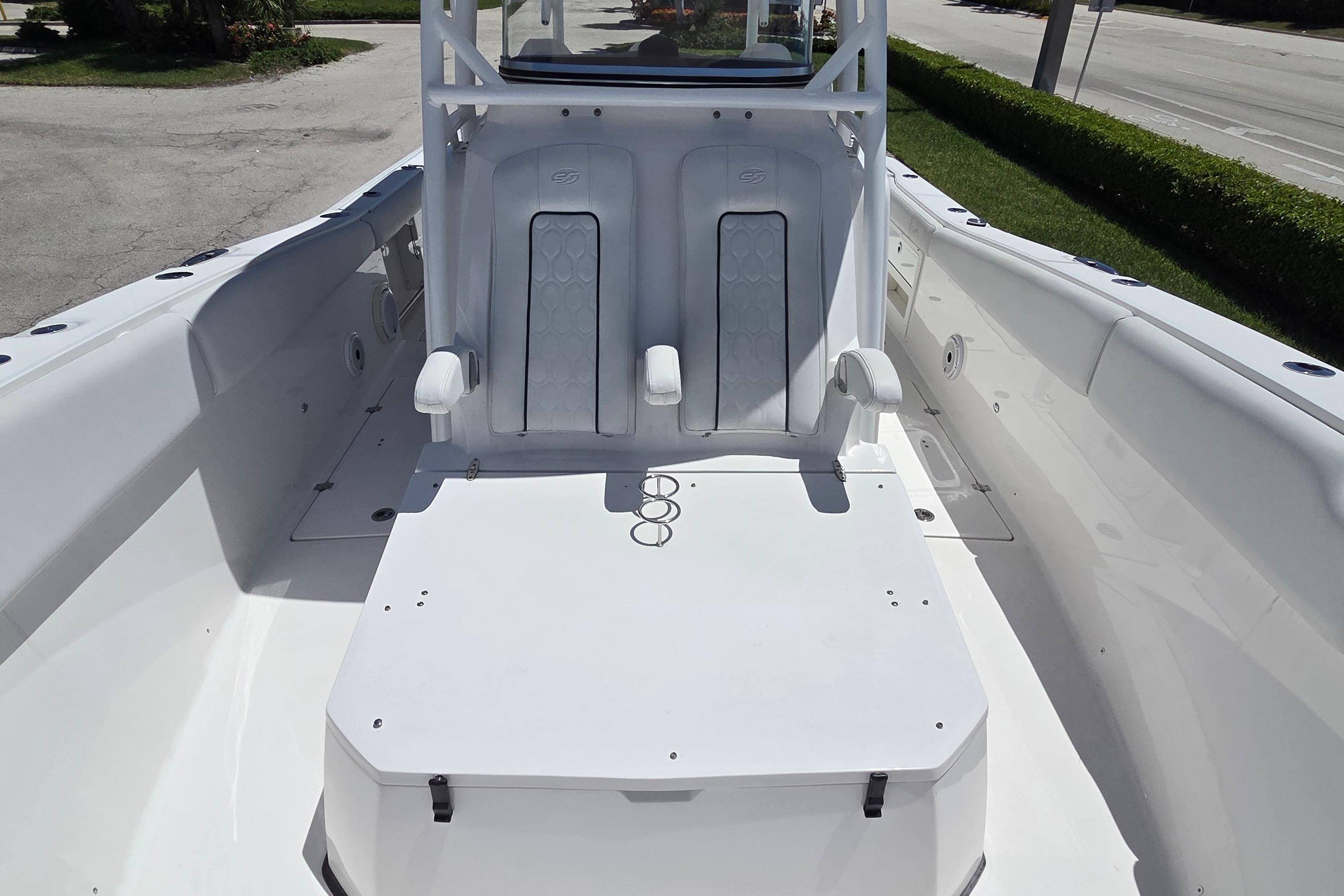 2021 Sea Fox 328 Commander boat interior with seating and storage.