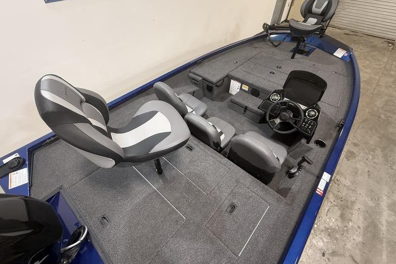 2026 Lowe Stinger 175C boat interior with seating and steering console.